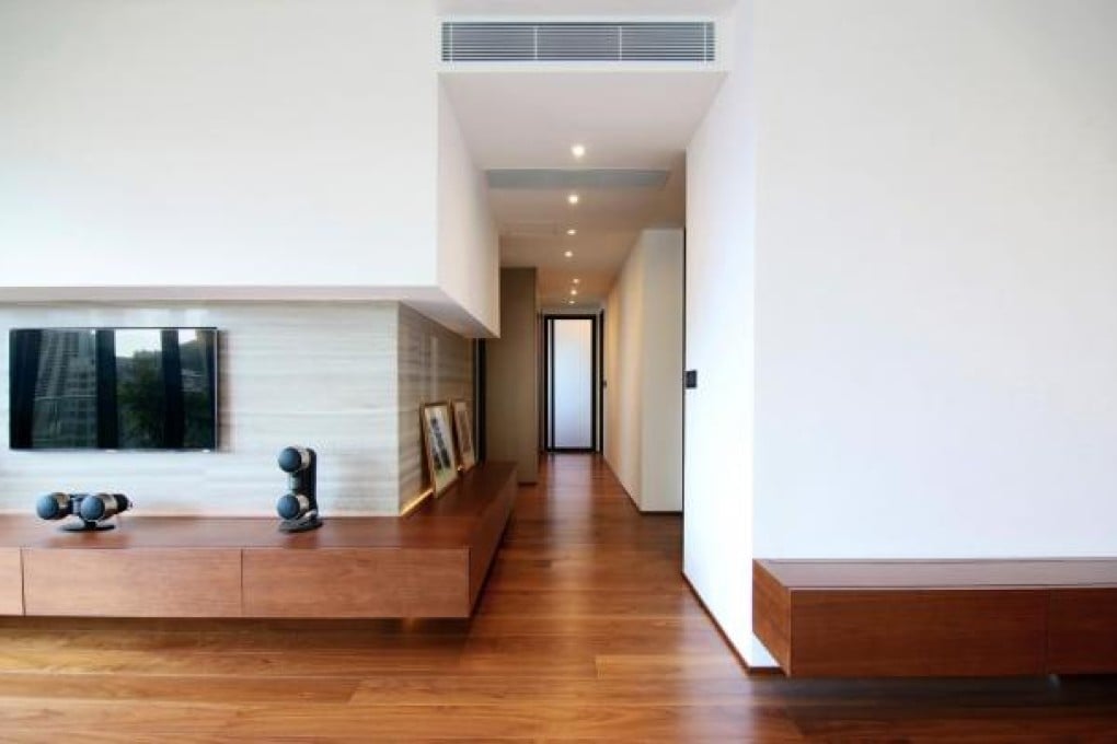 Interior designers go to great lengths to help clients create a clean and uncluttered look by concealing unsightly items such as air conditioners, cables, fridges and beds, among others. Photo: Su:b Design