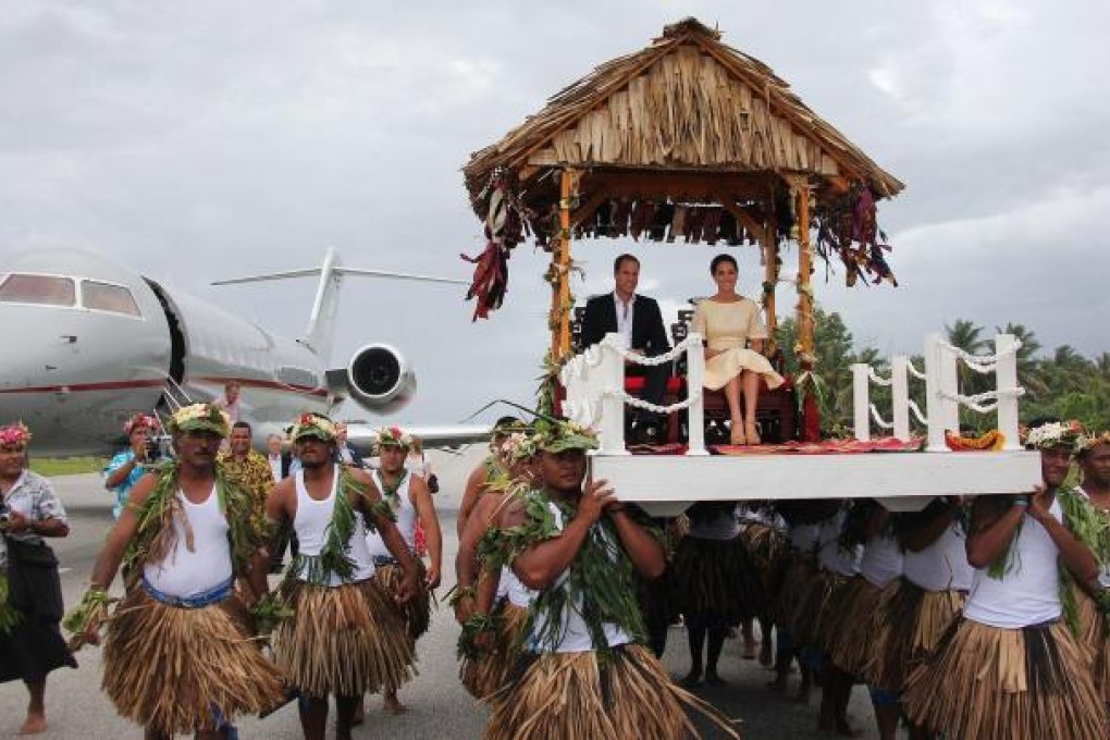Britain's Prince William and his wife Kate arrive in Tuvalu, as part of their Pacific tour. Photo: AFP