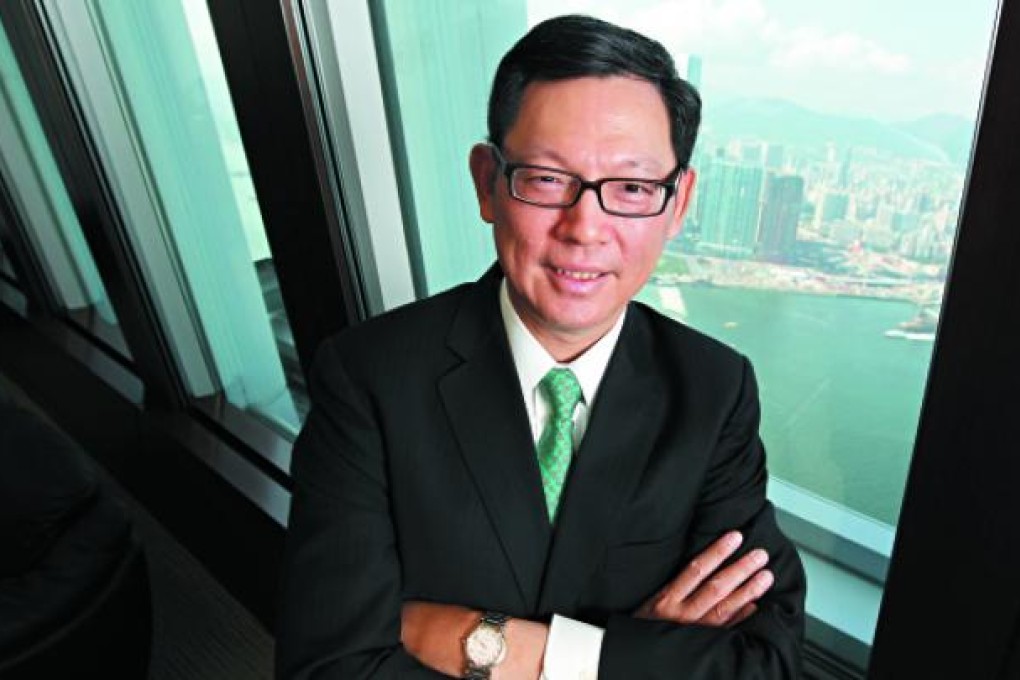 Chief executive of the Hong Kong Monetary Authority, Norman Chan, envisions a future for the city as the region's leading private banking centre. Photo: Dickson Lee