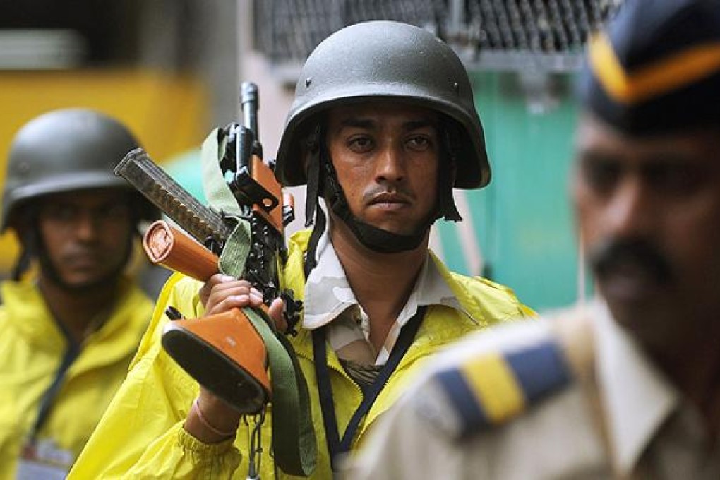 Indian soldiers patrol outside Mumbai's Arthur Road Prison where the lone surviving gunman from the 2008 Mumbai attacks is being held. Photo: AFP