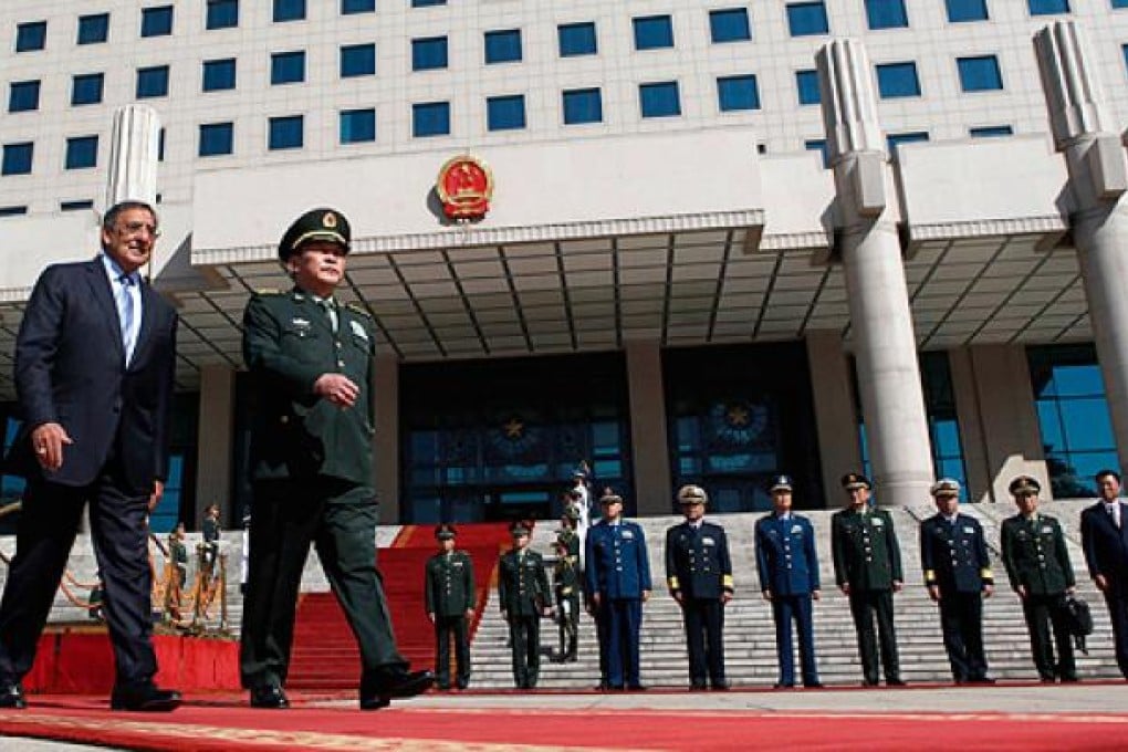 Defence Minister Liang Guanglie greets US Defence Secretary Leon Panetta (left) in Beijing. Photo: AFP
