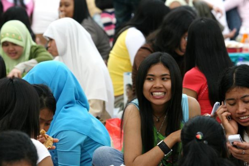 Domestics helpers are to be given a pay increase of 4.8 per cent, but critics have said it falls short of union demands for pay to go beyond HK$4,000