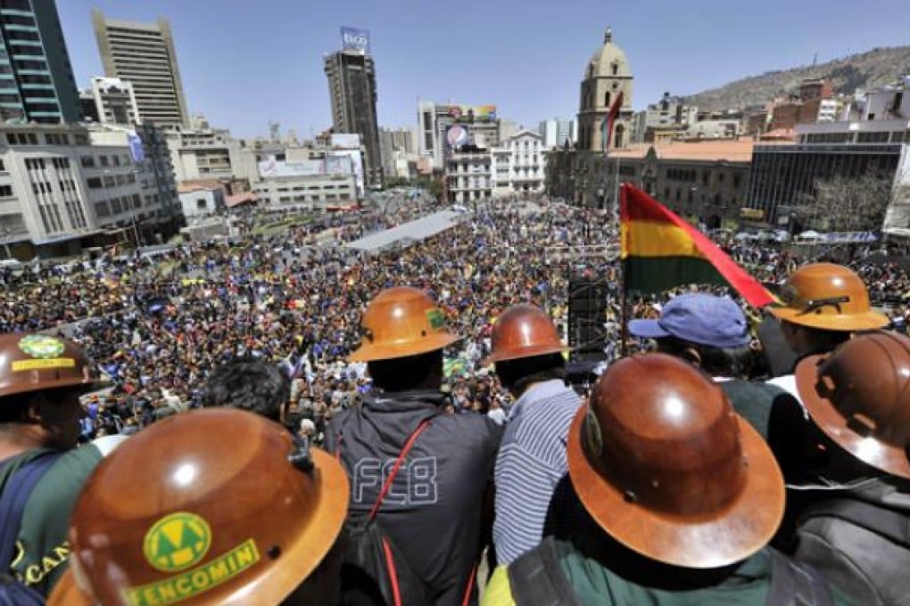 Miners from private cooperatives gather after marching in La Paz on Tuesday to protest against the government of President Evo Morales. Photo: AFP