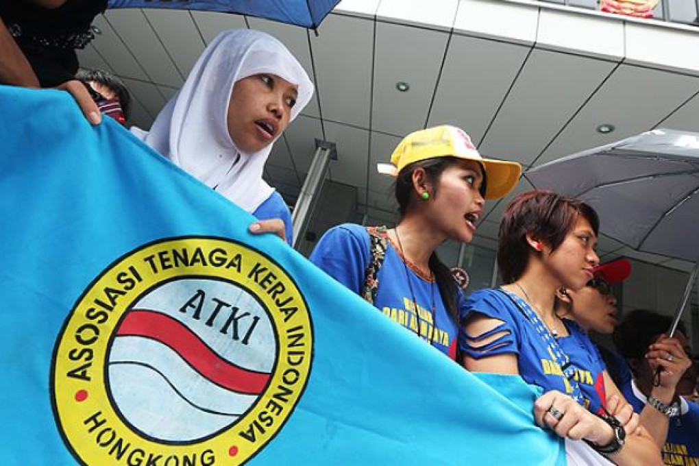 Maids rally for better pay outside government offices in Tamar. Photo: Sam Tsang