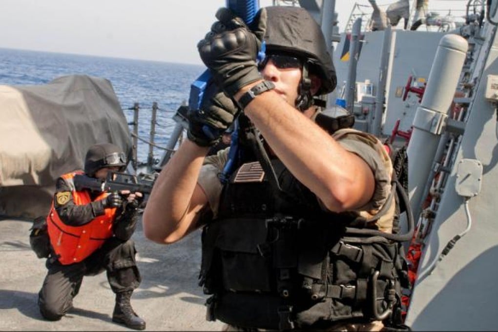 Sailors conduct a counter-piracy exercise on board the USS Winston S. Churchill. Photo: US Naval Forces Central Comman