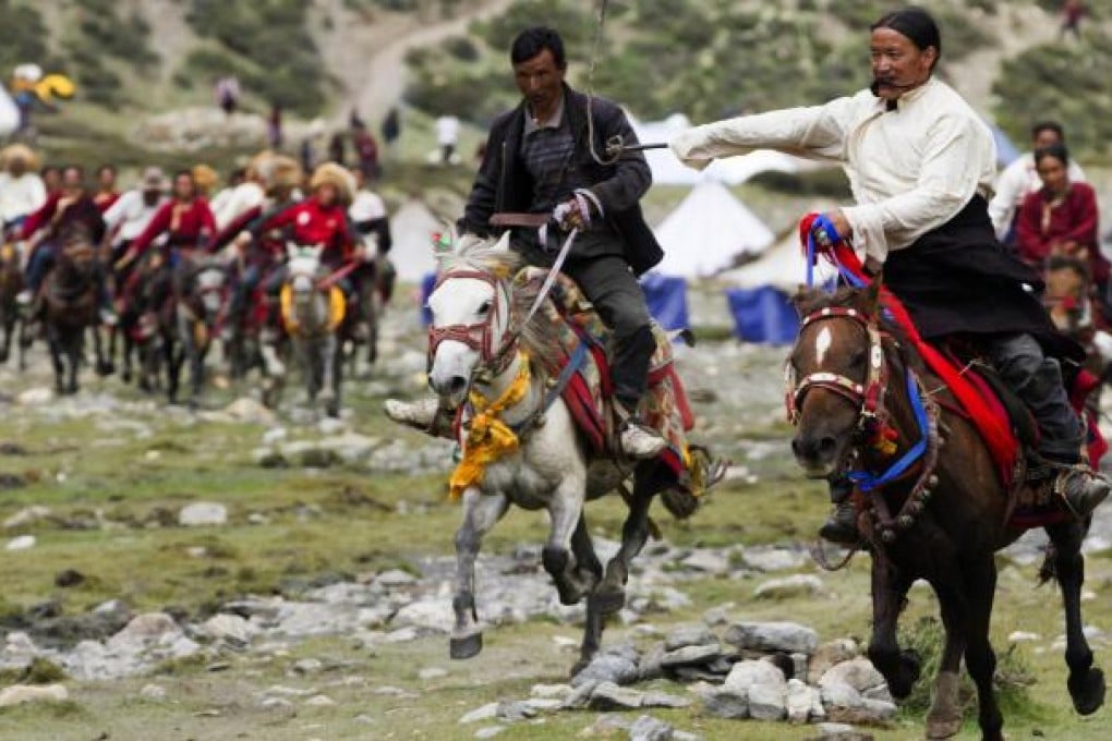 Riders compete in a horse race during the rare Shey Dragon Festival in Upper Dolpa, Nepal. Photo: AFP