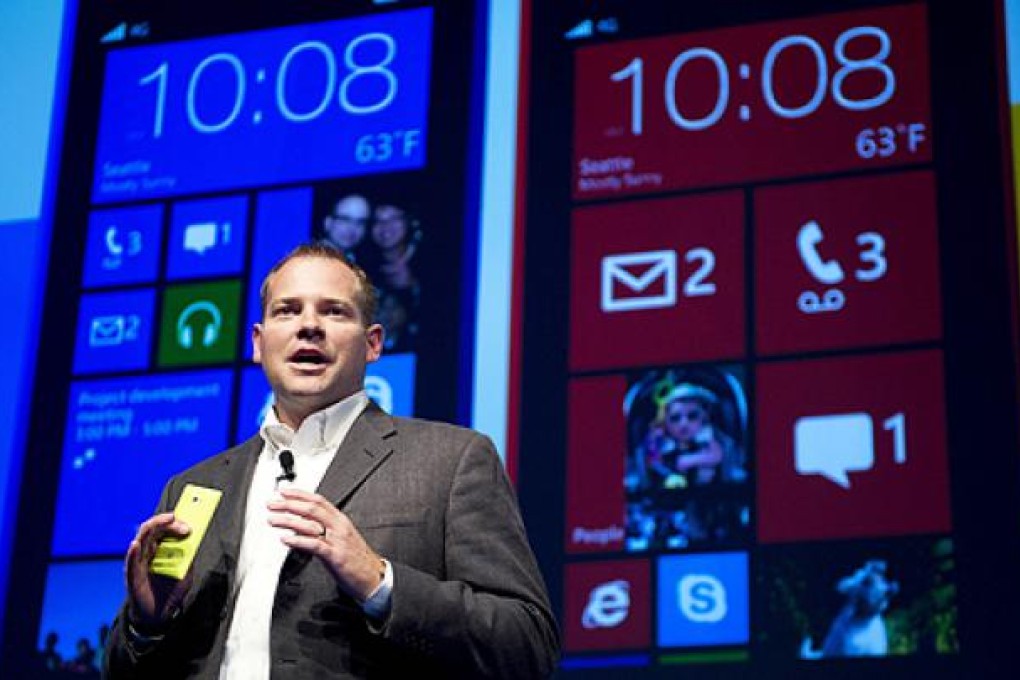 HTC's Jason Mackenzie introduces the new HTC 8S and HTC 8X smartphones in New York on Wednesday. Photo: AFP