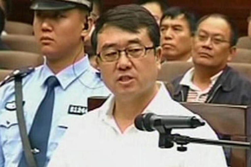 Ex-police chief Wang Lijun at court in Chengdu. Photo: Reuters