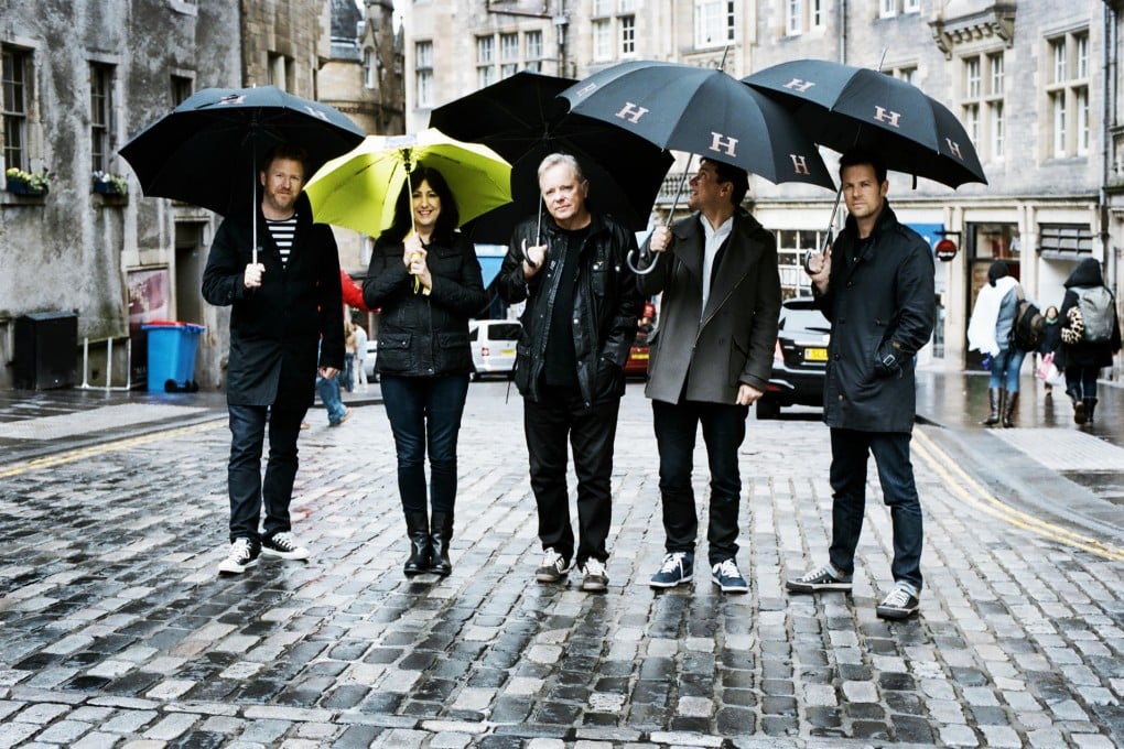 Then and now: Bernard Sumner, Stephen Morris, Ian Curtis and Peter Hook performing as Joy Division (left), and New Order today (above, from left) Phil Cunningham, Gillian Gilbert, Sumner, Morris and Tom Chapman.Photo: Redferns