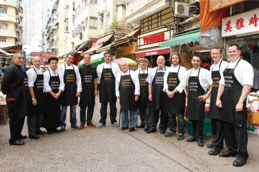 Chef Angel Pascual (fourth from left) cooked a feast for participating chefs during the Langham festival.
