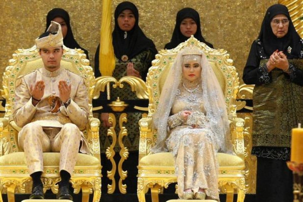 The royal couple were married in a traditional ceremony at the Sultan of Brunei's 1,700-room palace, followed by a state banquet. Photo: AFP