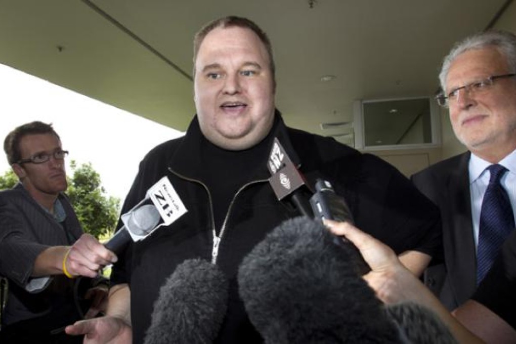 Kim Dotcom, the founder of the file-sharing website Megaupload, comments after he was granted bail and released on February 22 in Auckland, New Zealand. Photo: AP