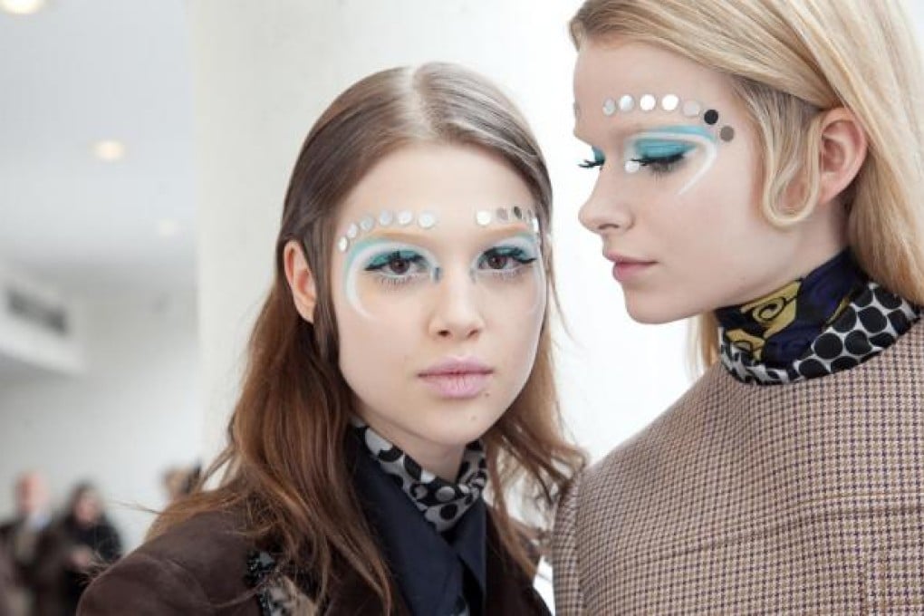Pat McGrath's playful look for miu miu featured false lashes, pop art-inspired paillettes and plenty of colour.