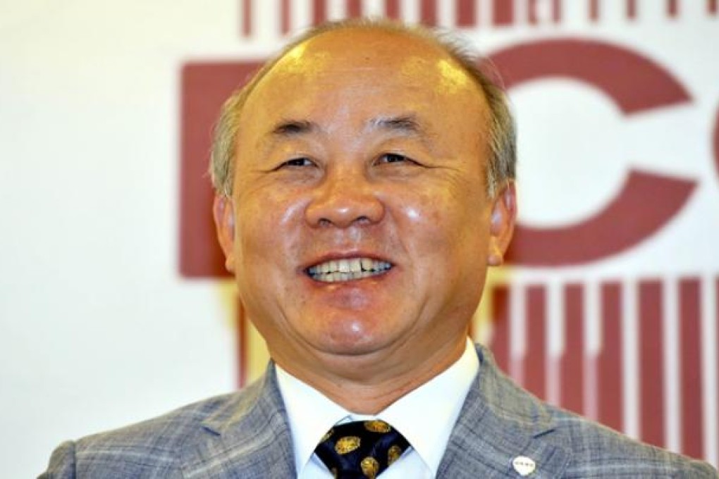 South Korean Unification Minister Yu Woo-ik smilies during a news conference in Seoul on Monday. Photo: AFP