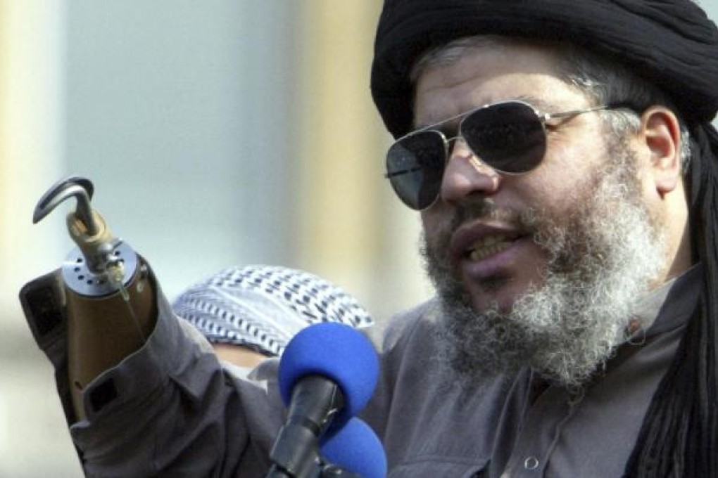 Abu Hamza al-Masri addresses a rally in London. Photo: Reuters