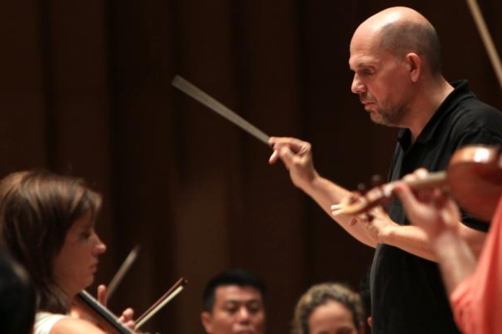 The Hong Kong Philharmonic Orchestra rehearses with conductor Jaap van Zweden, left, on November 17, 2011. Photo: SCMP