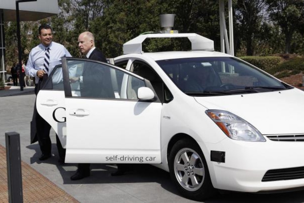 Jerry Brown arrives at Google in a driverless car to sign the bill.