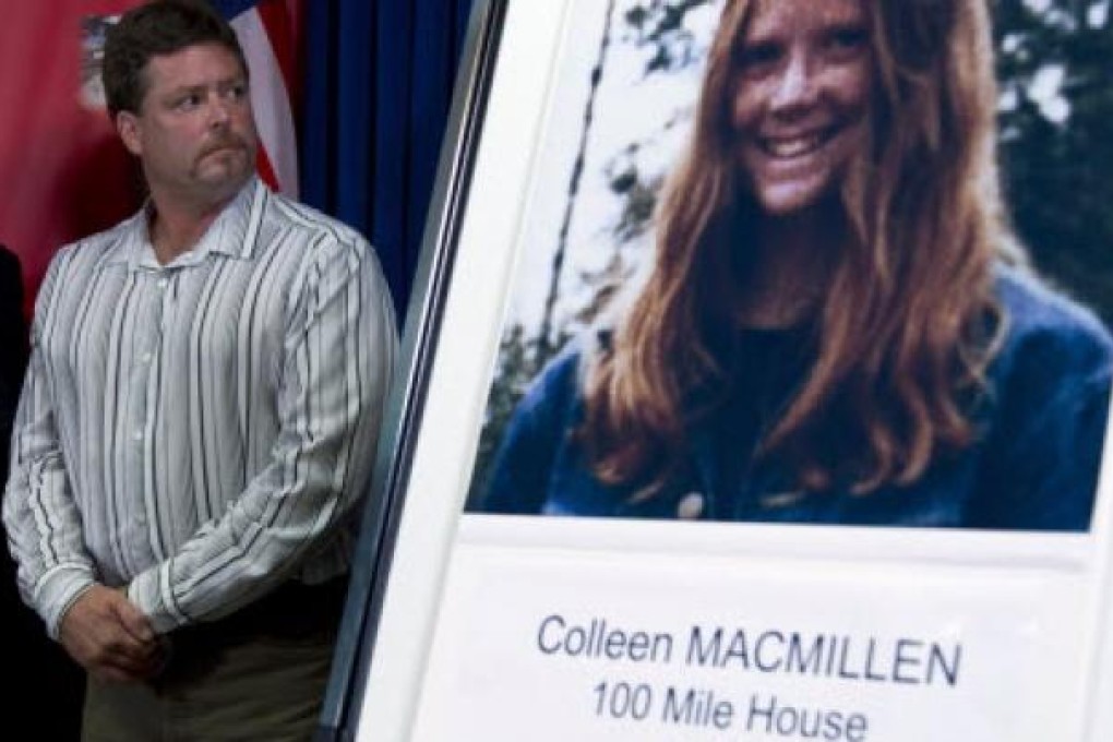 Shawn MacMillen, brother of murder victim Colleen MacMillen, looks towards a poster of his sister during a news conference in Surrey, British Columbia, Canada on Tuesday. Photo: Associated Press