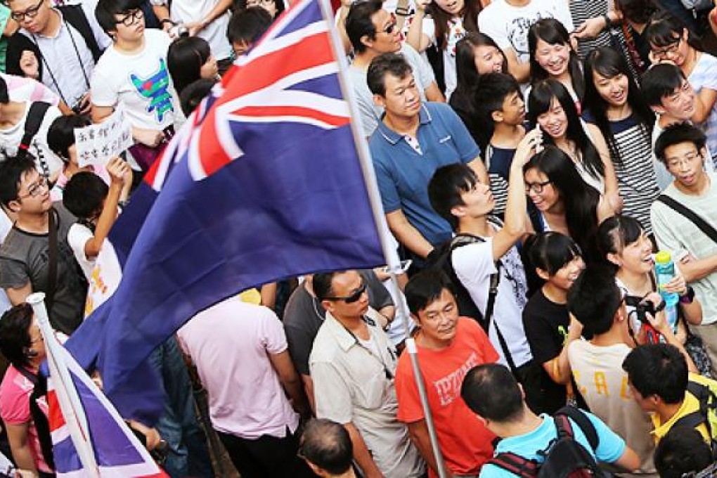 Protesters in Sheung Shui last week wave the Union Jack. Photo: David Wong