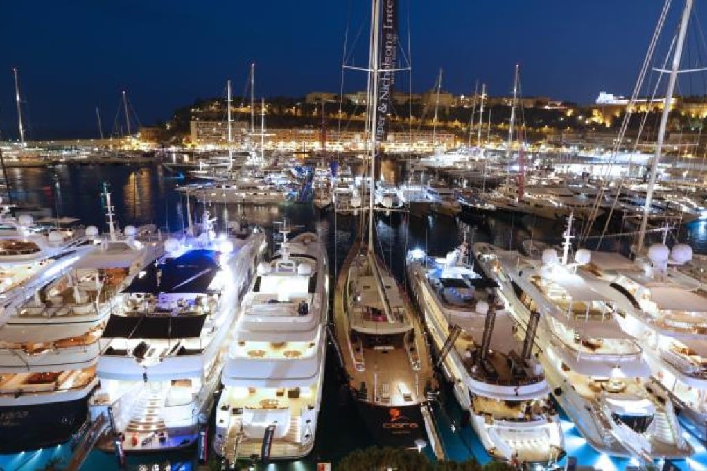 A picture taken on September 19, 2012 shows yachts moored at Port Hercules in Monaco during the 22th edition of the International Monaco Yacht Show. Photo: AFP