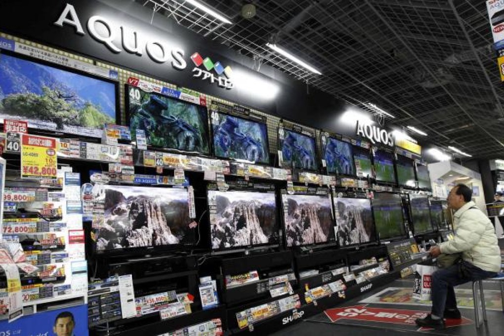 Television maker Sharp is cutting jobs and selling assets in a bid to cut costs and return to profit in the next financial year. Photo: Reuters