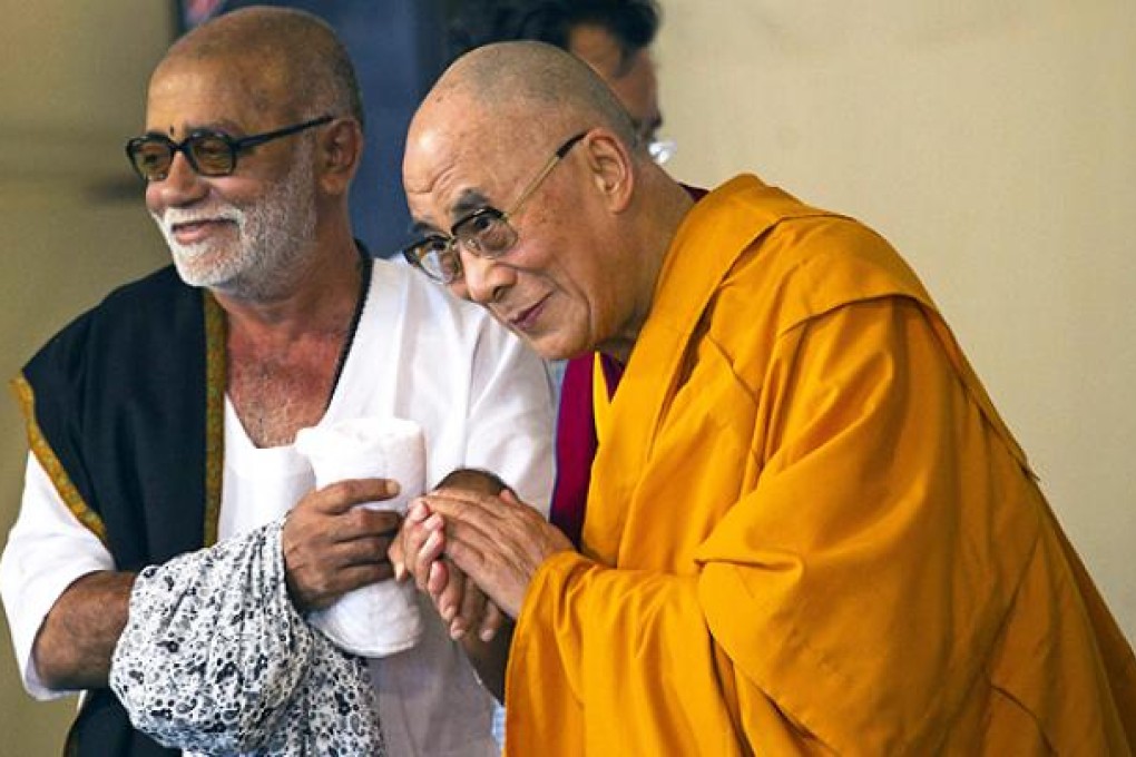 Tibetan spiritual leader the Dalai Lama and Hindu religious leader Morari Bapu in Dharamsala. Photo: AP