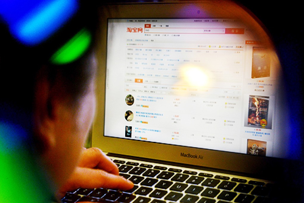 An online shopper looks for DVDs on Taobao.com, which is on a US list of “notorious markets” that sell fake goods. Photo: Thomas Yau