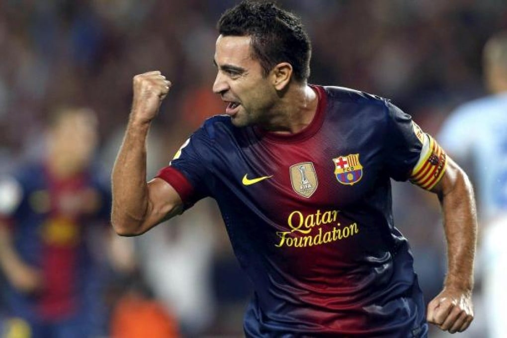Xavi Hernandez said: "Eight points is a lead that I like." Photo: EPA