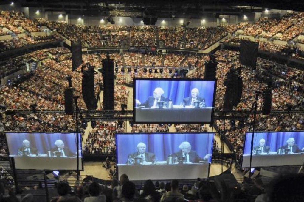 Berkshire Hathaway shareholders to Dow Jones Industrial Average: let our people in. Photo: AP