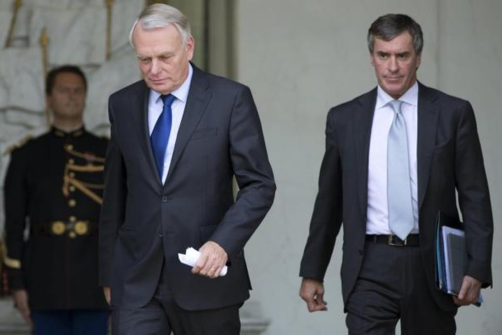 Prime Minister Ayrault (left) takes a tough line. Photo: Reuters