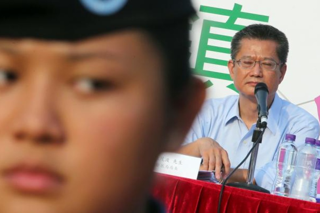 Paul Chan Mo-po, Secretary for Development, attends a Study Forum on North East New Territories New Development Areas held by the Government in Sheung Shui.