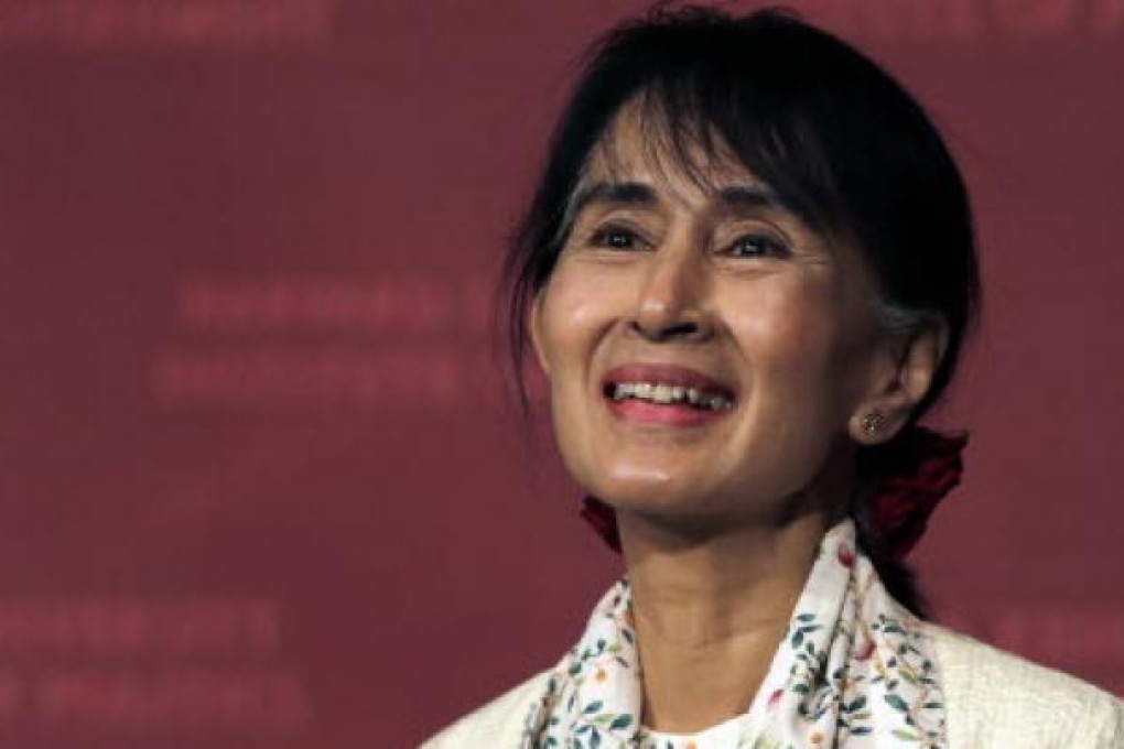 Myanmar democracy leader Aung San Suu Kyi smiles during an address at Harvard University's Kennedy School of Government in Cambridge. Photo: AP