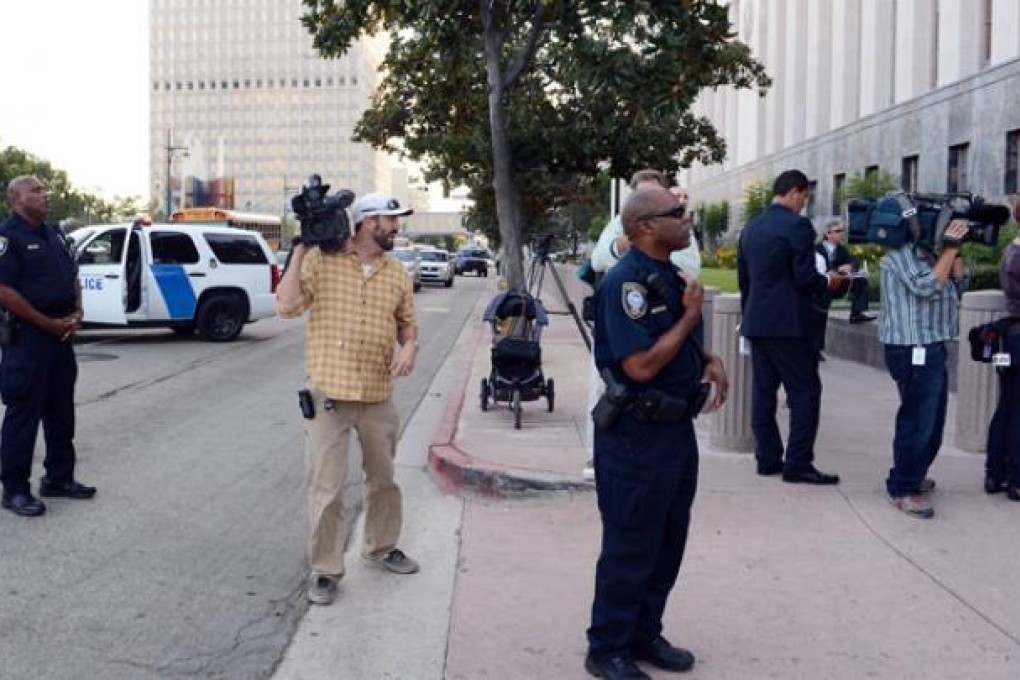 Homeland Security police block traffic as alleged anti-Islamic filmmaker Nakoula Basseley Nakoula is driven out of the US Federal Courthouse on Thursday in Los Angeles, California. Photo: AFP