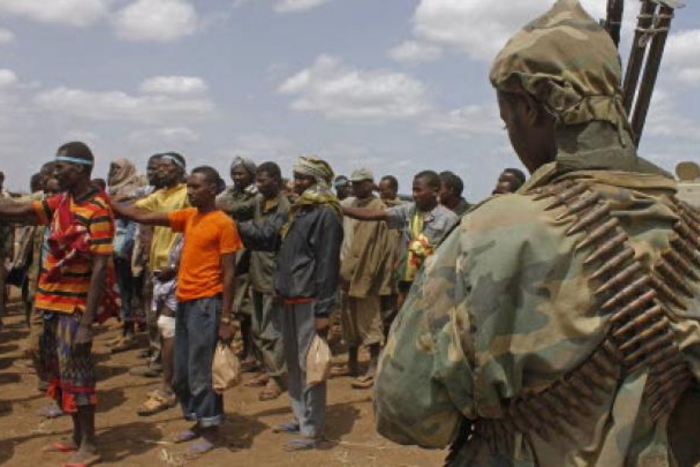 Al-Qaeda linked Shebab after giving themselves up to forces of the African Union Mission in Somalia. Photo: AFP