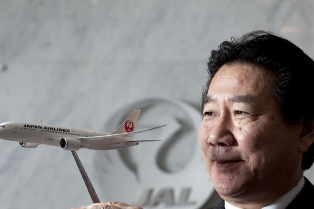 JAL president Yoshiharu Ueki, a former pilot, says one of his flying highlights was landing at the old Kai Tak airport. Photo: Bloomberg