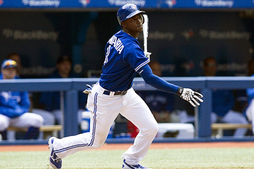Toronto Blue Jays' Adeiny Hechavarria hits an RBI double to right against the New York Yankees on Saturday. Photo: AP