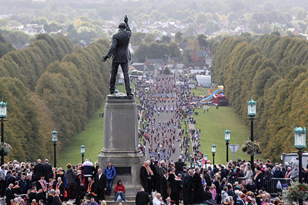 Tens of thousands of Protestants marched through Belfast to mark 100 years since a landmark event in the history of Ireland's partition on Saturday. Photo: AFP