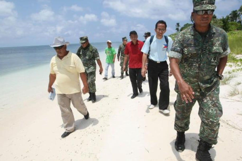 Garrison head Juancho Sabban leads an island tour. Photo: AFP