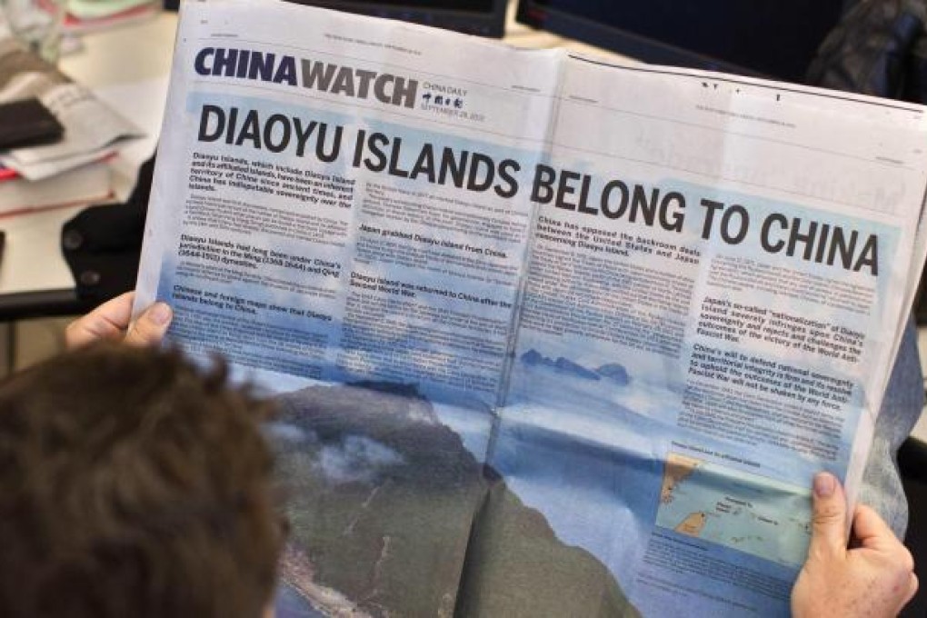 A double-page ad in the New York Times announces China's right to the Diaoyu Islands, which are also claimed by Japan. Photo: Reuters