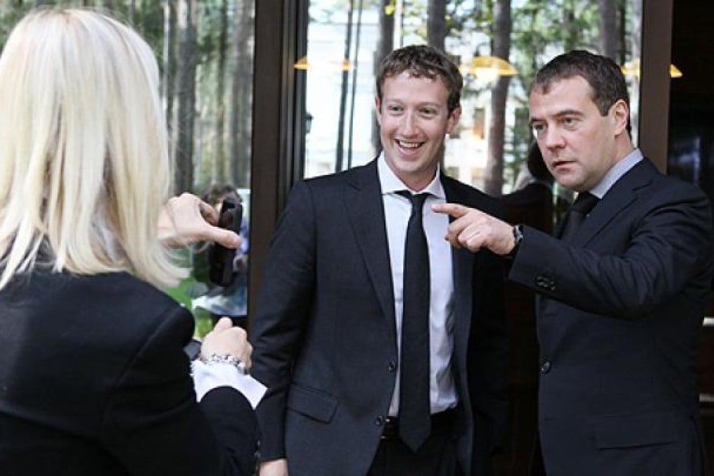 Russian Prime Minister Dmitry Medvedev (right) and Facebook chief Mark Zuckerberg meet outside Moscow on Monday. Photo: AFP