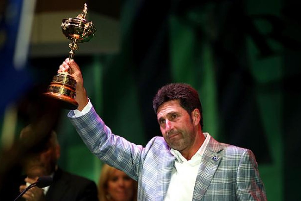 European team captain Jose Maria Olazabal holds the Ryder Cup at the closing ceremony after Europe defeated the USA to retain the Ryder Cup. Photo: AFP