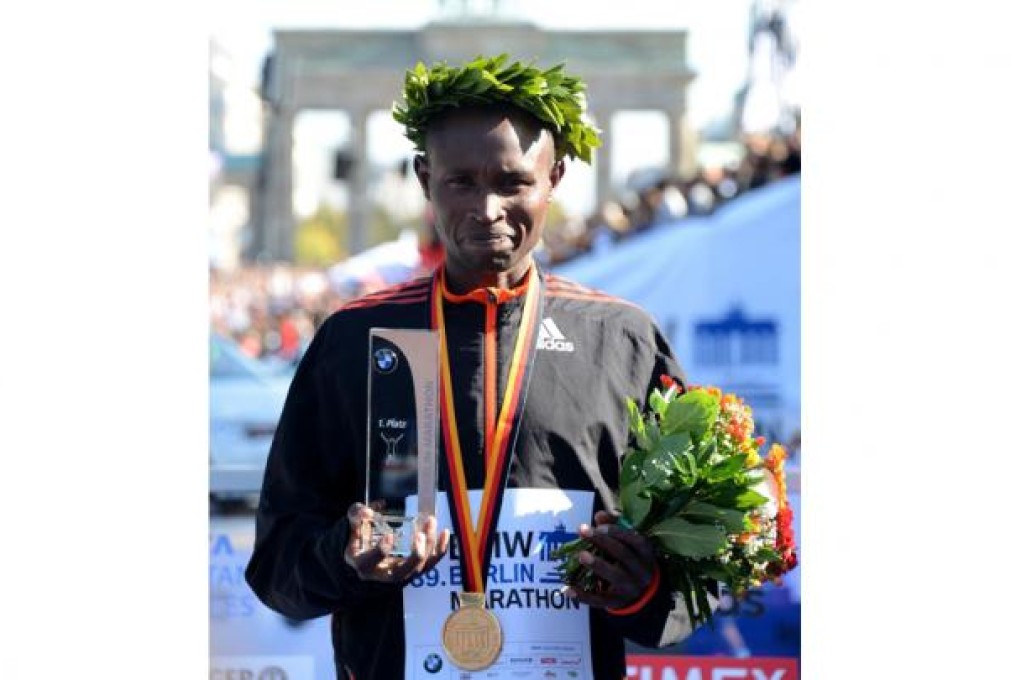Geoffrey Mutai celebrates his Berlin win. Photo: AFP