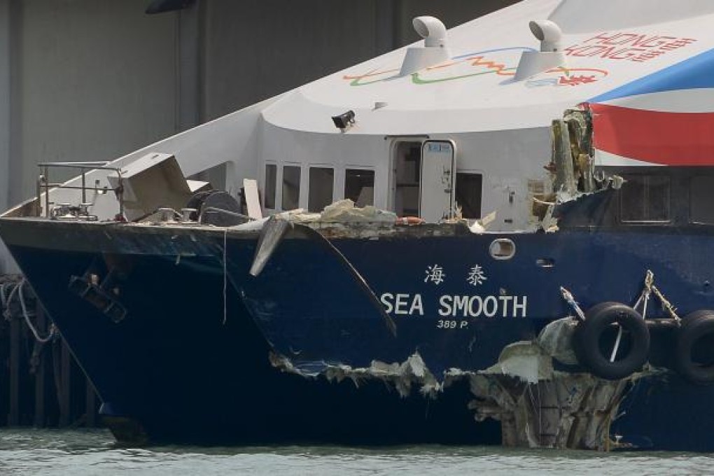 The Sea Smooth ferry with its bow badly damaged sits docked at the Lamma Island pier on October 2, 1012. Photo: AFP
