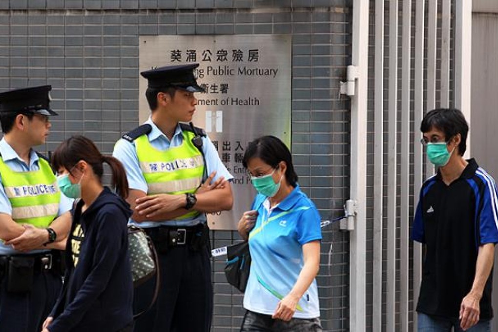 Relatives of the victims of the Lamma ferry sinking leave Kwai Chung mortuary on Tuesday. Photo: Nora Tam