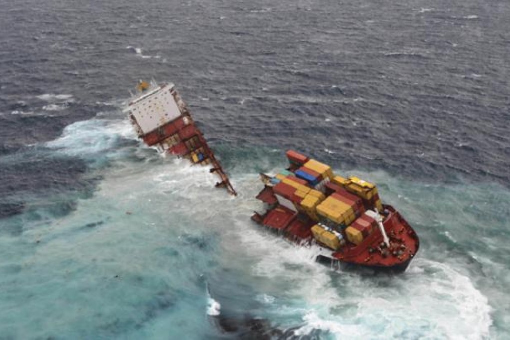 Stranded cargo ship Rena breaks in two pieces after being pounded by waves six metres high off New Zealand''s North Island. Photo: AP