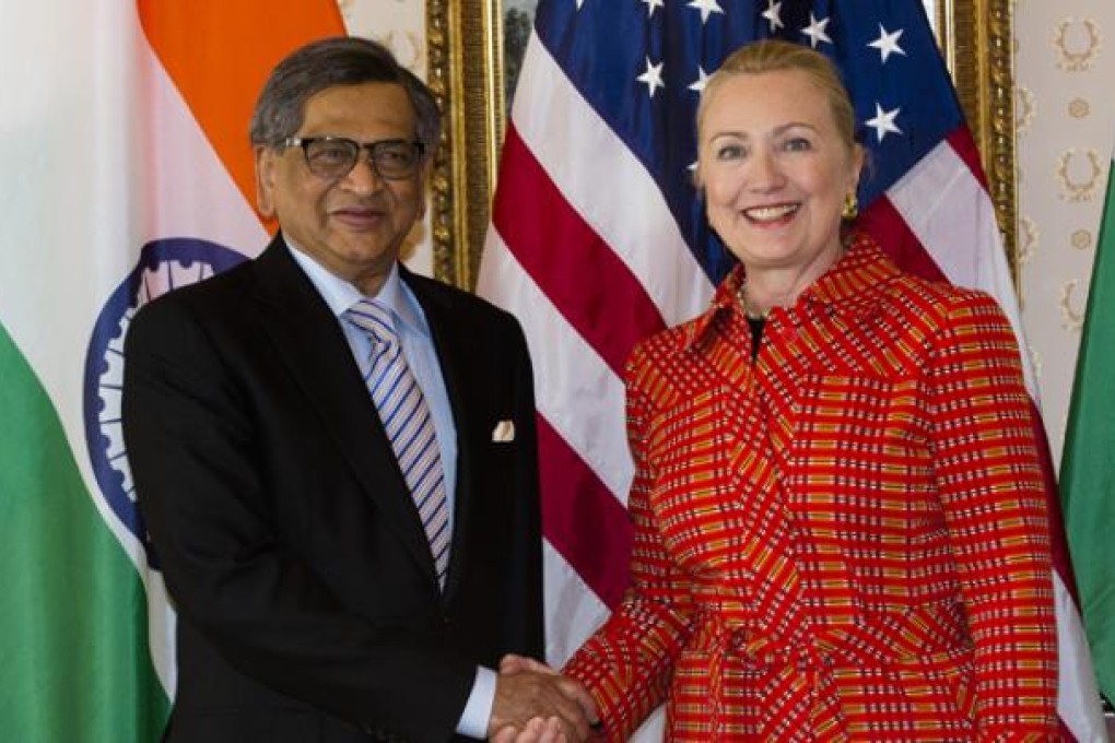 Indian Foreign Minister Somanahalli Mallaiah Krishna shakes hands with United States Secretary of State Hillary Clinton before a meeting at the Waldorf Astoria hotel during the 67th United Nations General Assembly on Monday. Photo: AP