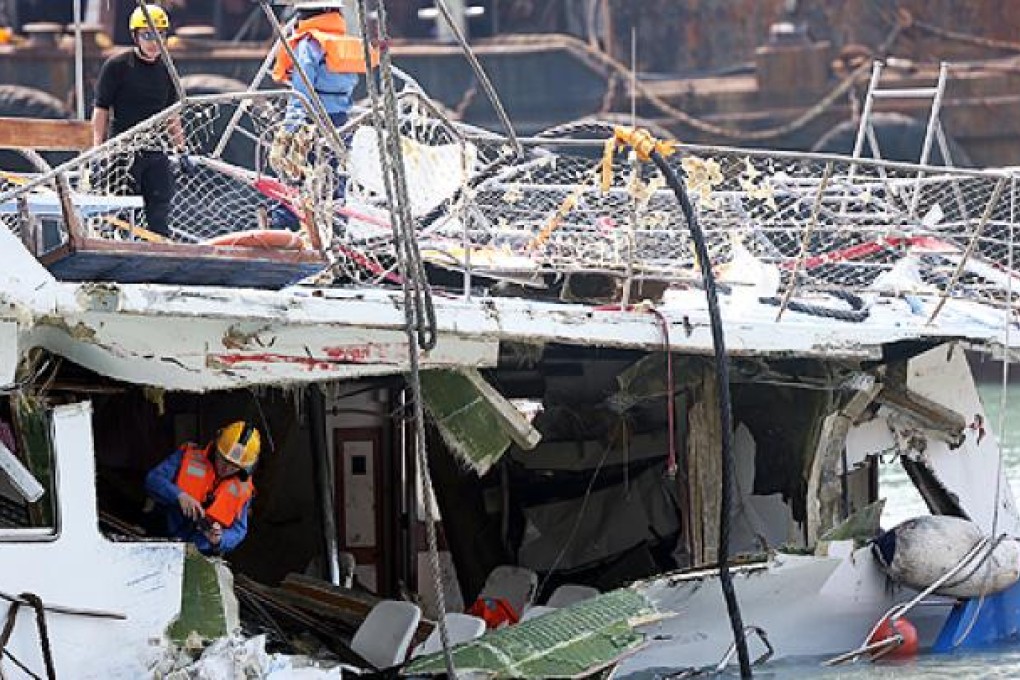 Authorities inspect the damage on the Lamma IV boat on Wednesday. Photo: David Wong