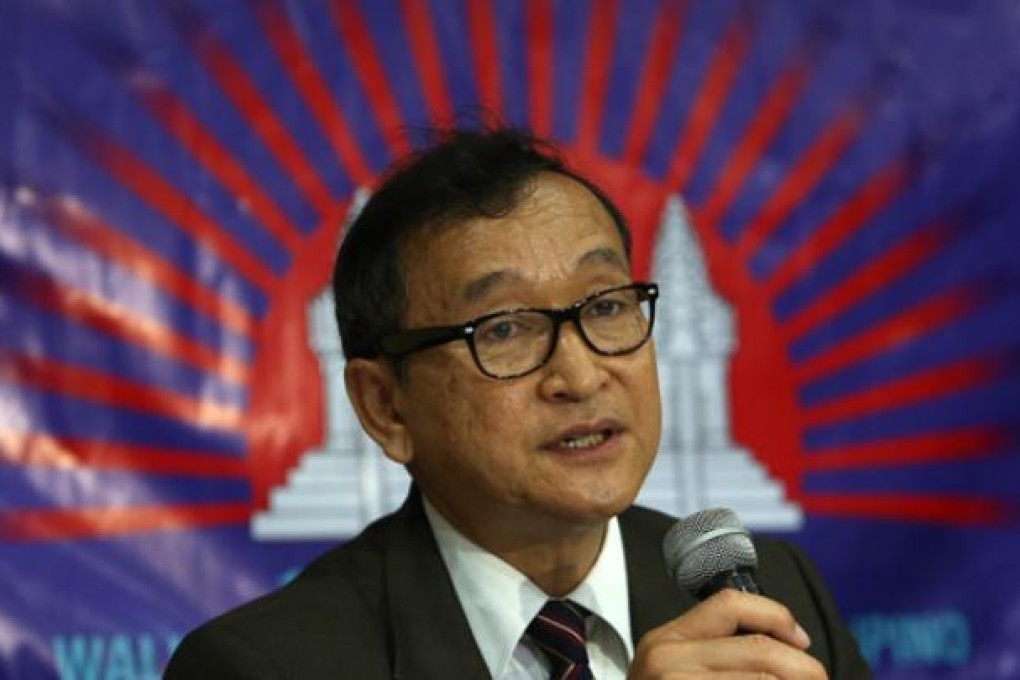 Cambodian opposition party leader Sam Rainsy speaks during a press conference in San Juan City, east of Manila, on September 10. Photo: EPA