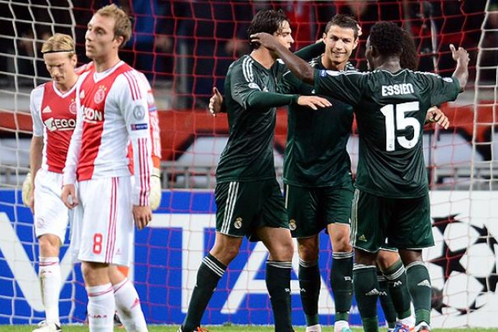 Real Madrid's Cristiano Ronaldo scores hits first goal against Ajax. Photo: AFP