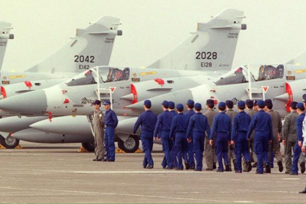 French-made Mirage 2000- 5 jets are displayed in the Hsinchu airbase in northern Taiwan before they are commissioned into Taiwan's air force. Photo: AFP